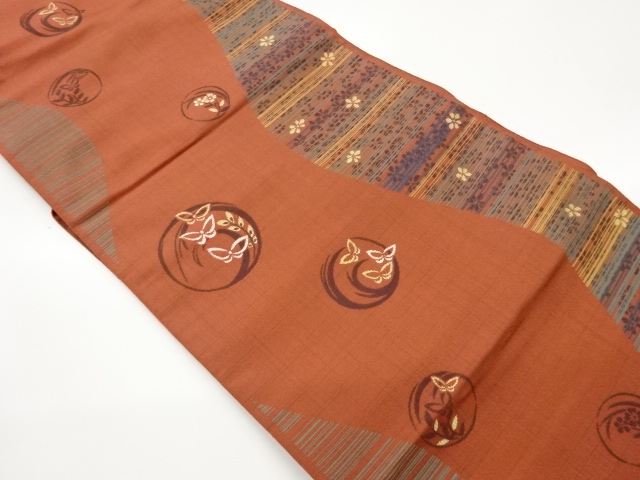 丸文に蝶・花々・横段模様織出し名古屋帯